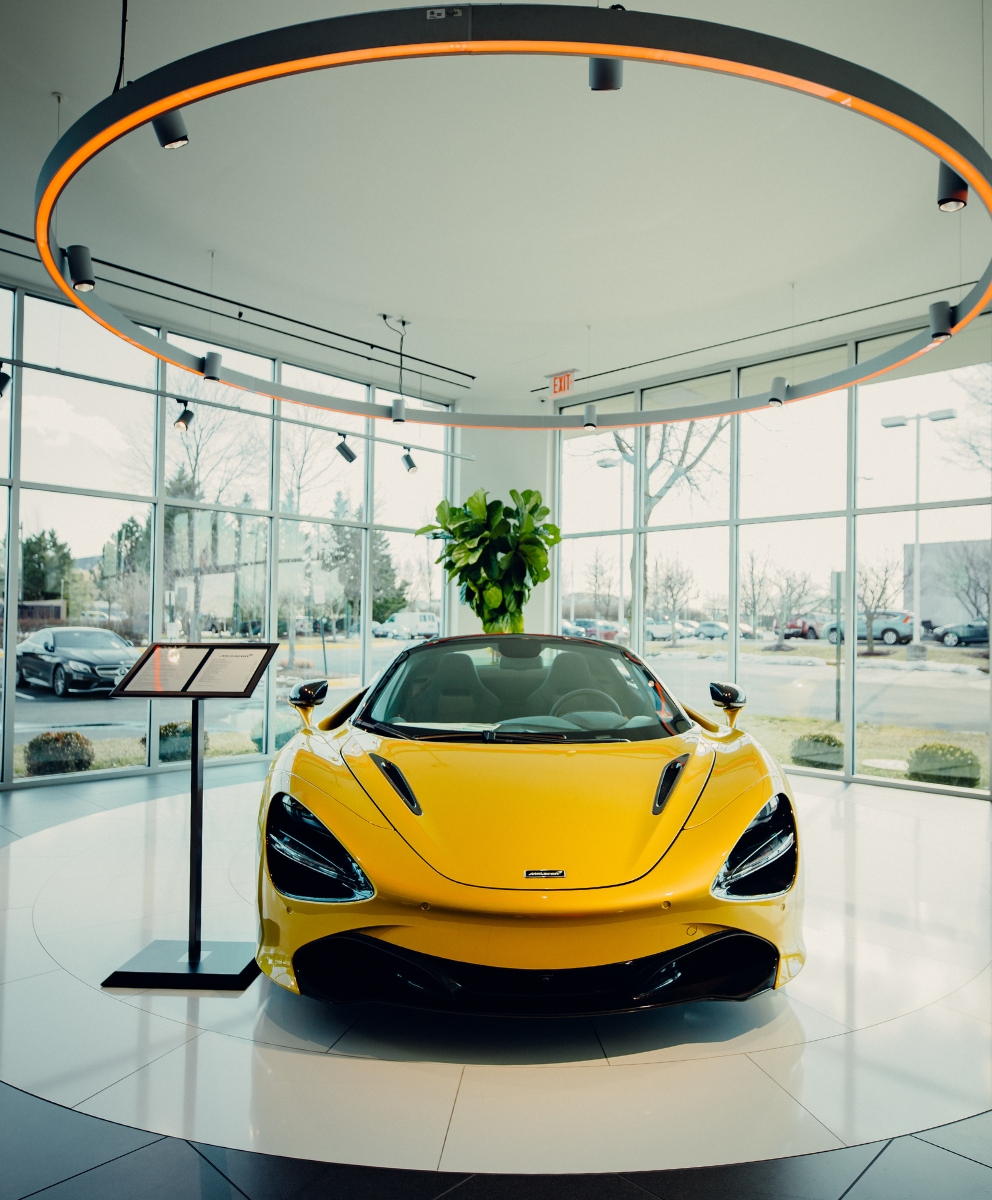 Yellow sports car representing auto purchasing options