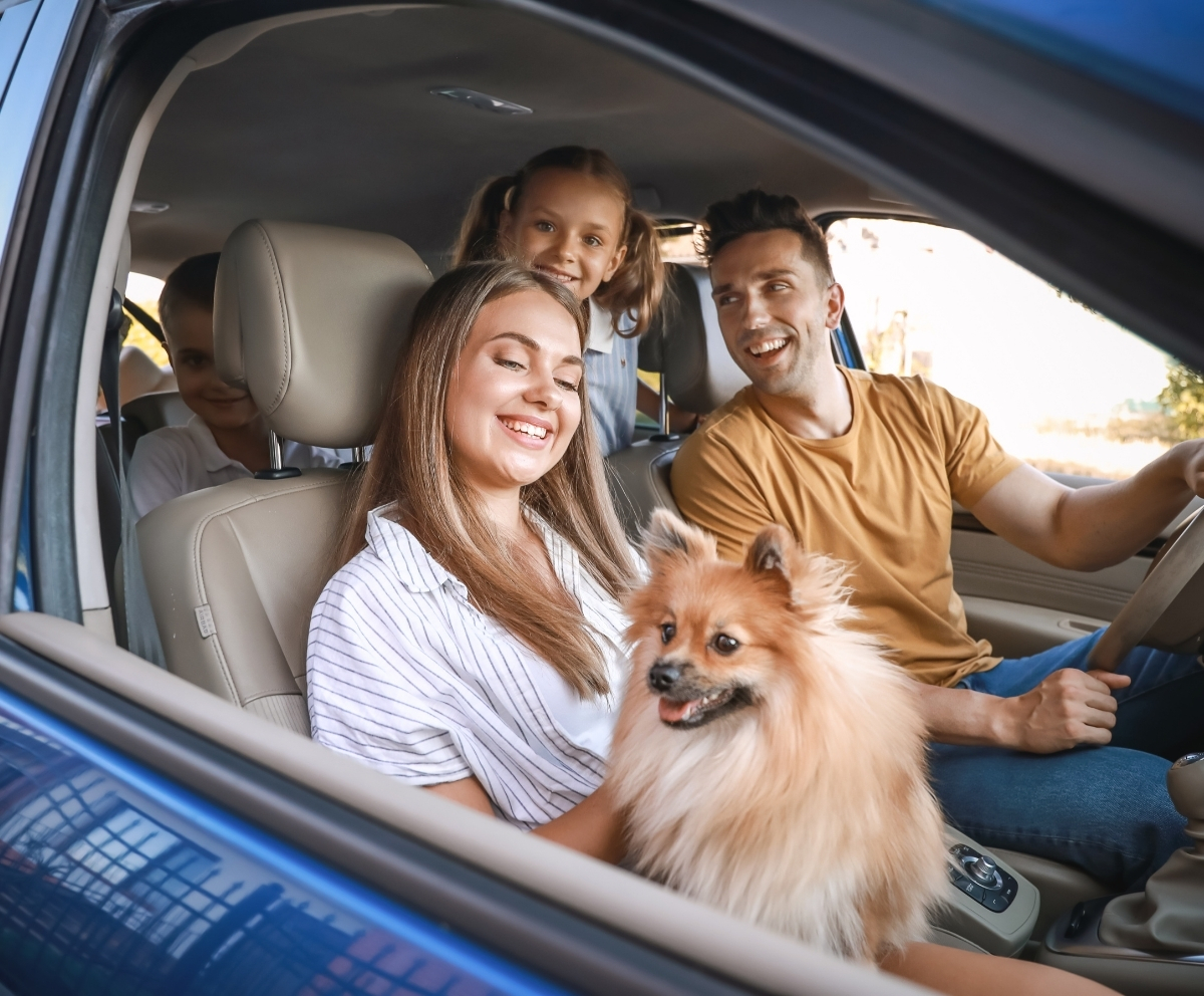 Family sitting in a vehicle protected by optional GAP coverage