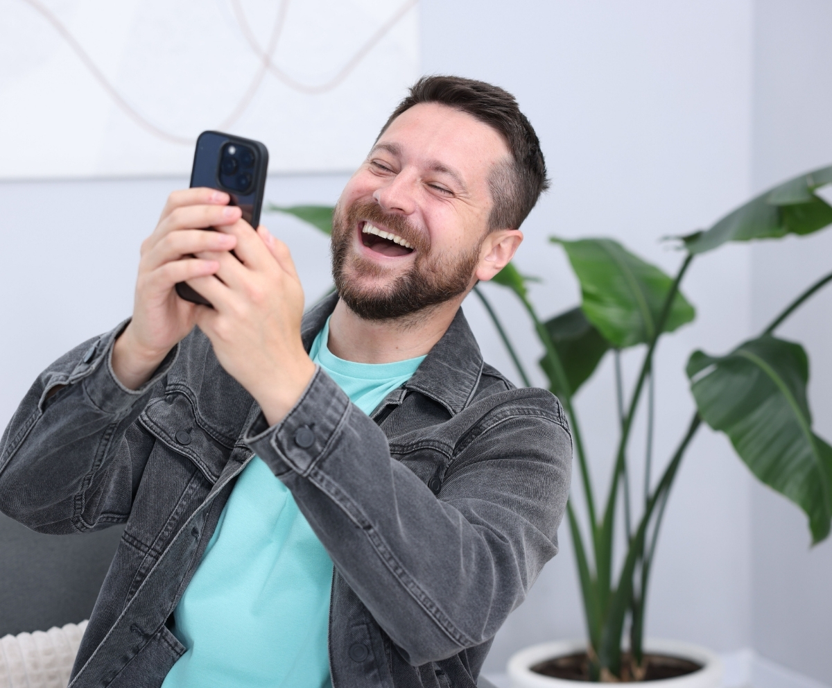 Man using mobile banking on a smartphone for eChecking account access