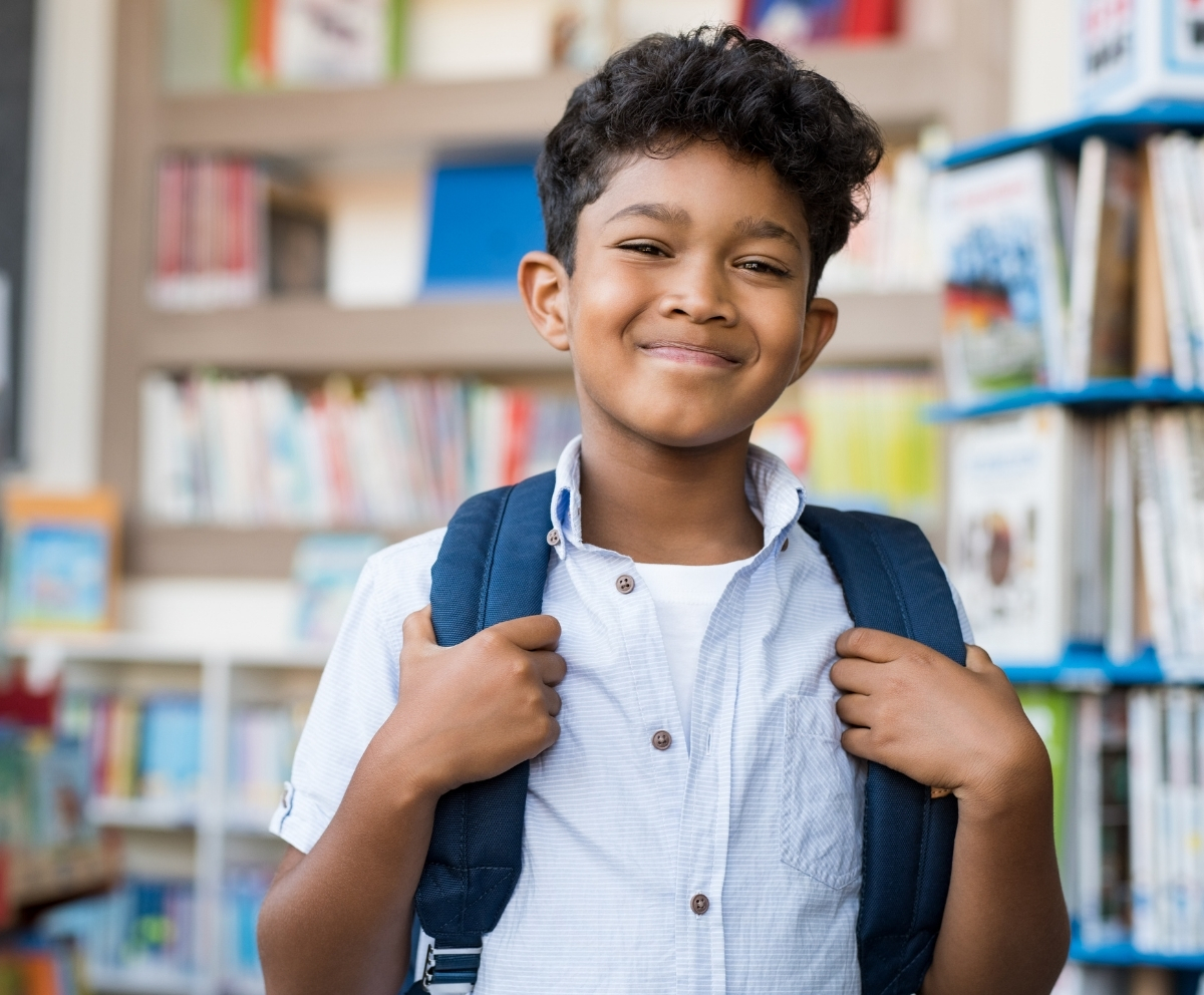 Child with backpack representing back-to-school savings with a Club Account