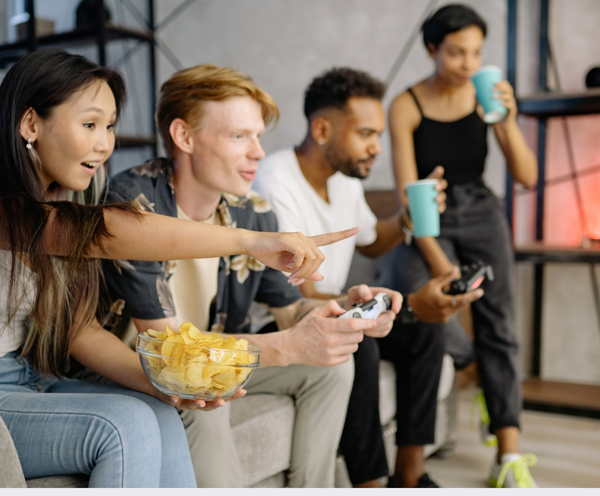 Friends enjoying time together, representing saving for entertainment and personal goals