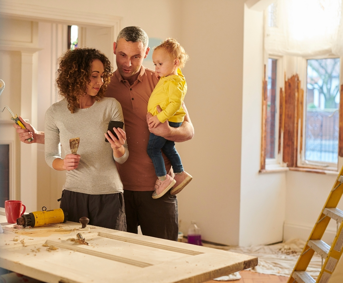 Family reviewing home renovation plans using a Home Equity Line of Credit