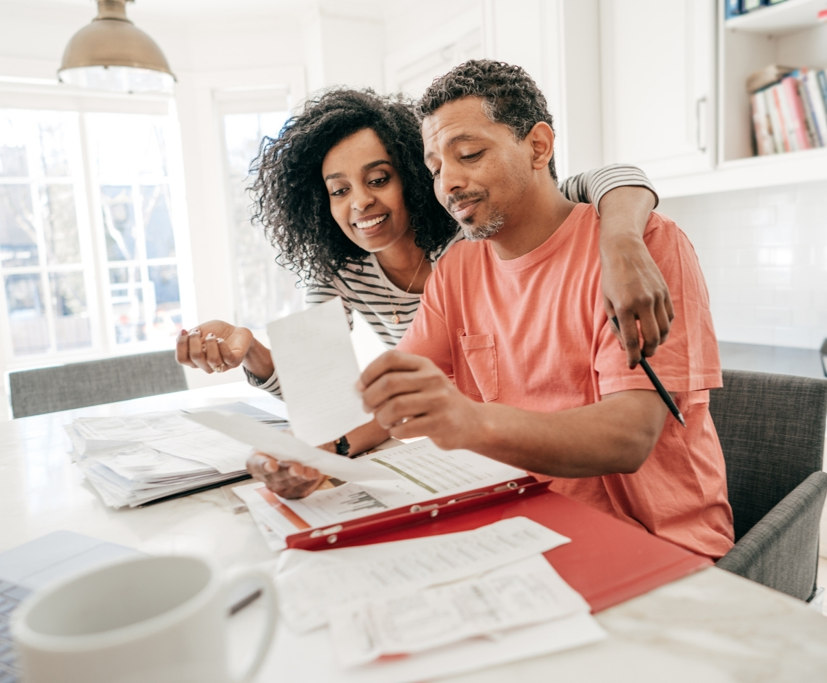 Couple reviewing household expenses and HELOC financing options