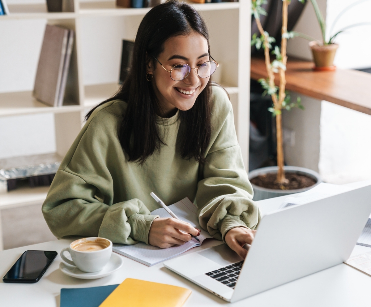 Woman using Online Banking to review account activity and manage finances