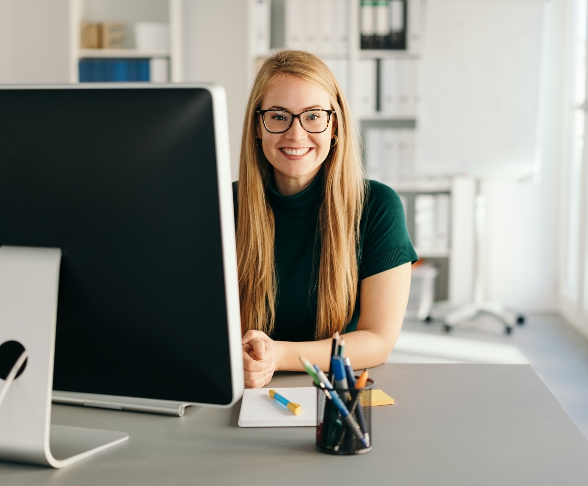 Woman using Online Banking to manage payments, transfers, and account alerts