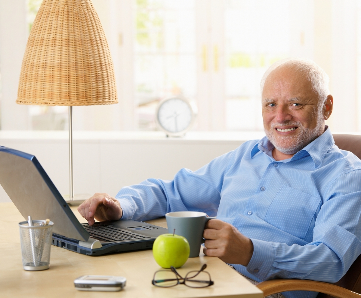 Man using Online Banking at home to access eStatements and account information