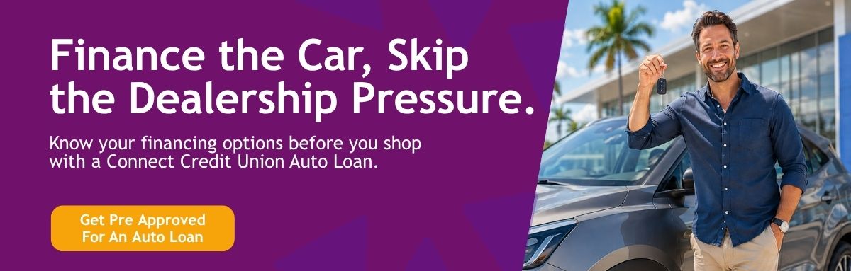 man in front of his new car that he purchased with a connect credit union auto loan